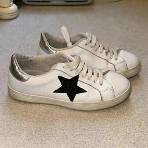 Steve Madden White Sneakers with Black Star and Silver Accents
